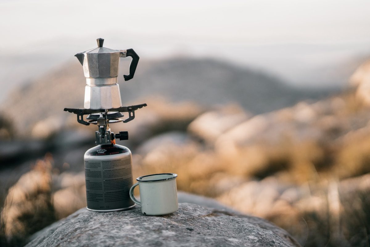 Process of making camping coffee outdoor Stock Photo by bondarillia