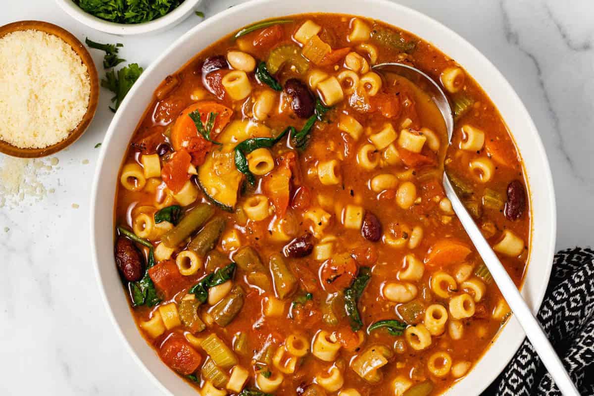 https://gowanderwild.com/wp-content/uploads/2023/03/Minestrone-soup-Midwest-Foodie-1.jpg