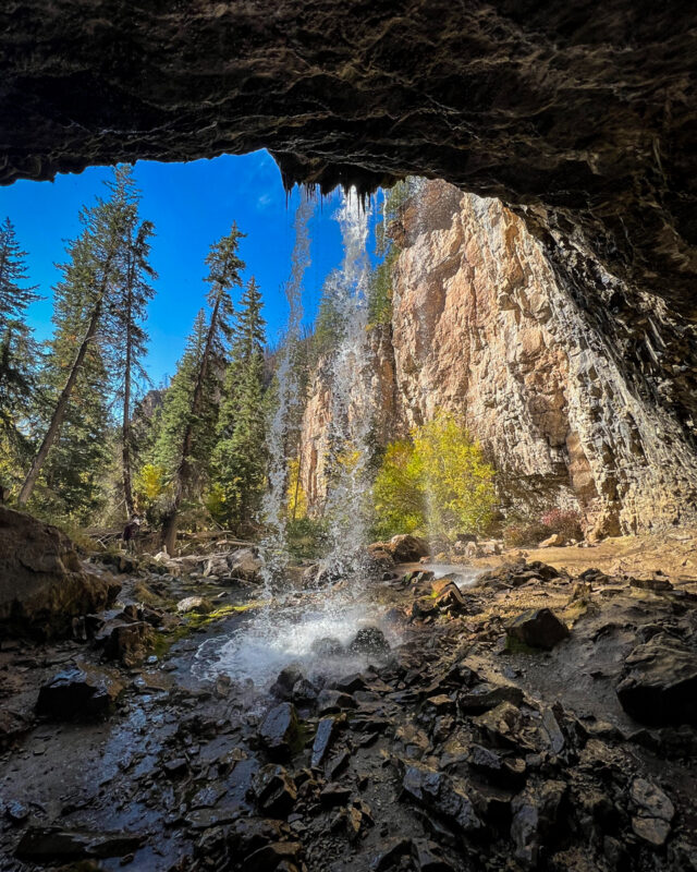 Behind the Spouting Rock waterfalls at Hanging Lake