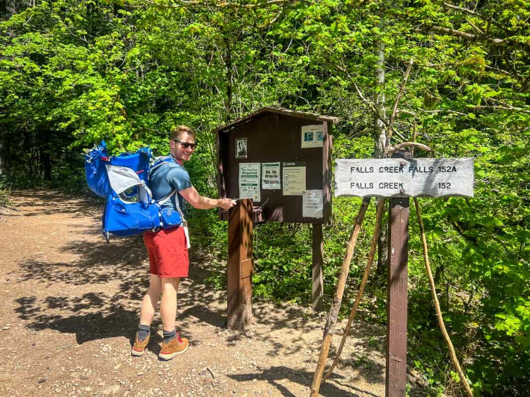 Paying the day use parking fee at Falls Creek Falls in Washington